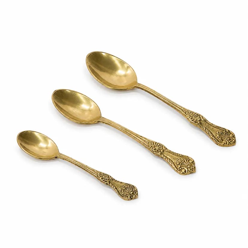 Engraved brass spoon